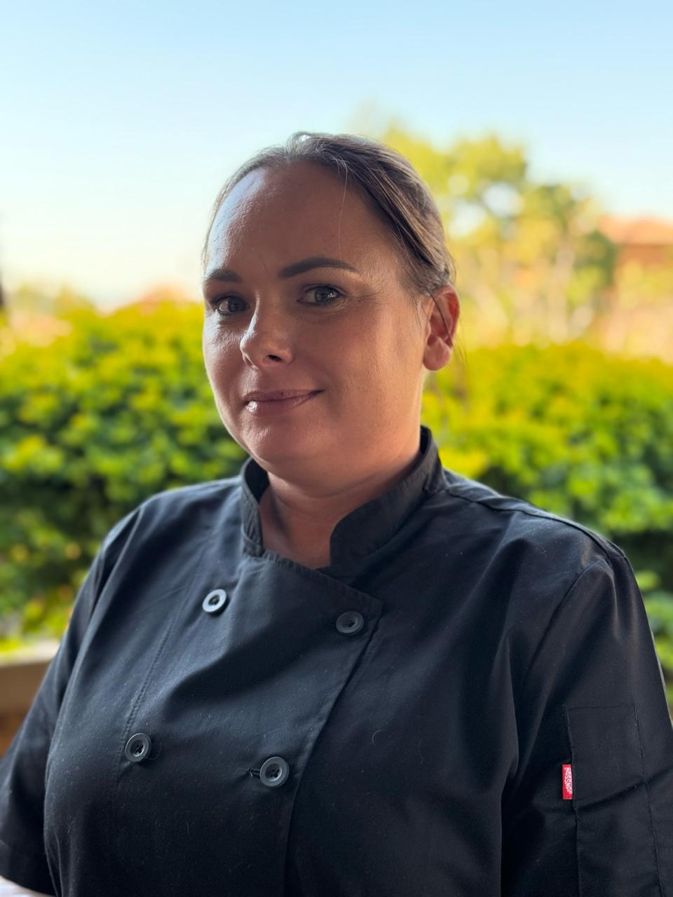 Professional chef plating food